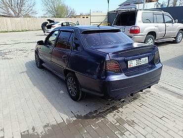 тюнинг глушителя: Обмен бар Основные особенности: - Кузов: 4-дверный седан, темно‑синий — 6