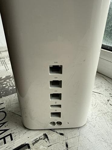 Модемы и сетевое оборудование: Apple AirPort Time Capsule A1470 с HDD 2 Tb - Двухдиапазонный Wi‑Fi — 2
