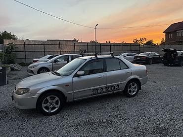 pes 2013: Mazda 323: 2003 г., 1.6 л, Механика, Бензин, Седан — 2
