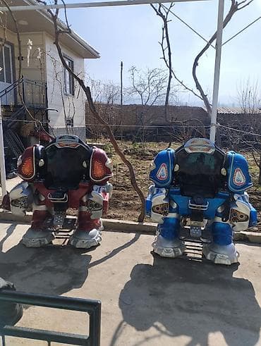 Готовый бизнес: Детские электромобили-аттракционы «роботы» (2 шт.) - Формат: сидячие — 1