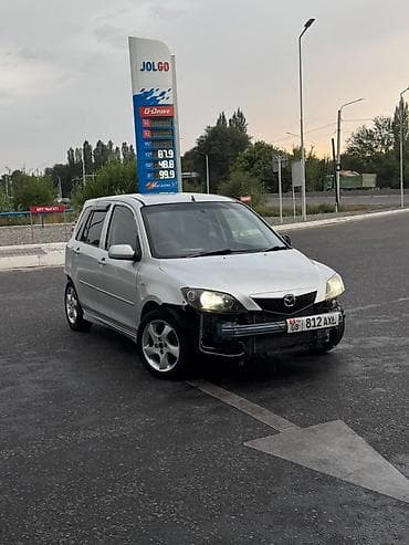 Mazda Demio: 2002 г., 1.5 л, Типтроник, Бензин, Хэтчбэк — 1