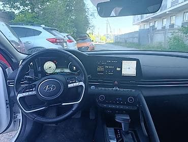 значок ауди: Hyundai Avante: 2021 г., 1.6 л, Автомат, Гибрид, Седан — 1