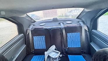 Renault Logan: 2012 г., 1.4 л, Механика, Бензин, Седан — 4