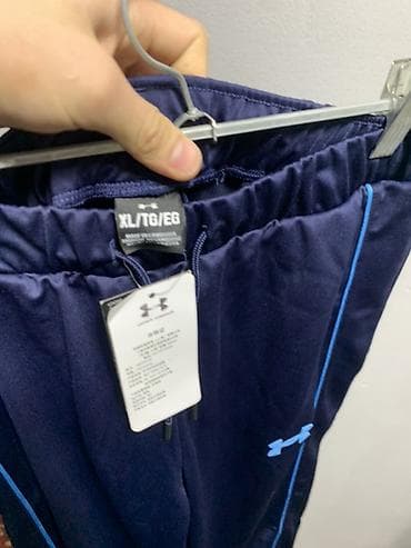 Спортивная одежда: Спортивные брюки Under Armour - Модель: тренировочные брюки с — 2