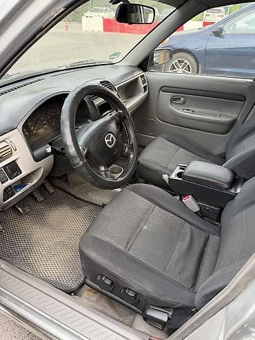 стеклоподъёмники: Mazda Demio: 2003 г., 1.3 л, Механика, Бензин, Хэтчбэк — 7