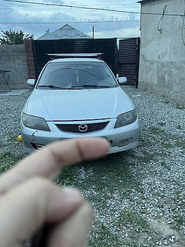 chek it: Mazda 323: 2005 г., 1.6 л, Механика, Седан — 1