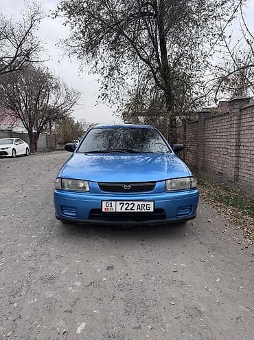 Mazda 323: 1999 г., 1.5 л, Ручные, Бензин, Седан