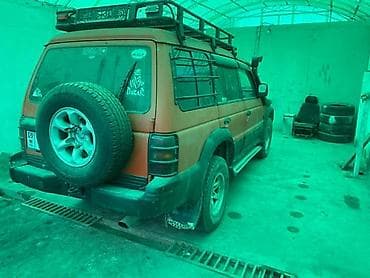 мото ролик: Mitsubishi Pajero: 1993 г., 3 л, Автомат, Бензин, Внедорожник — 6