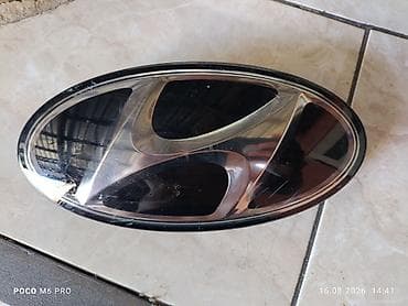 Эмблема Hyundai для решётки радиатора - Овальная эмблема с фирменным — 1