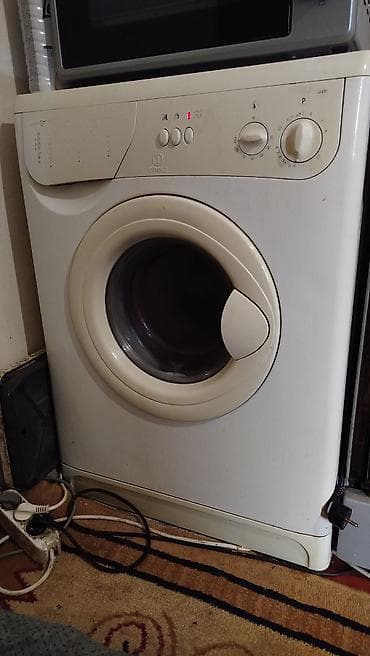 Стиральная машина Indesit, фронтальная загрузка. Характеристики и