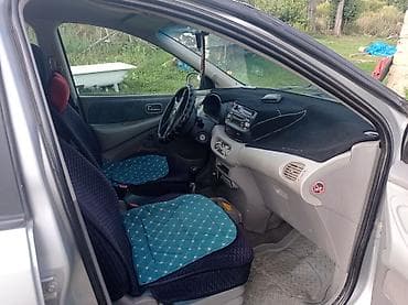 bew e34: Nissan Tino: 2002 г., Автомат, Минивэн — 5