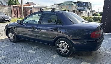 сидения на фуру: Mitsubishi Carisma: 2000 г., 1.6 л, Автомат, Газ, Седан — 5