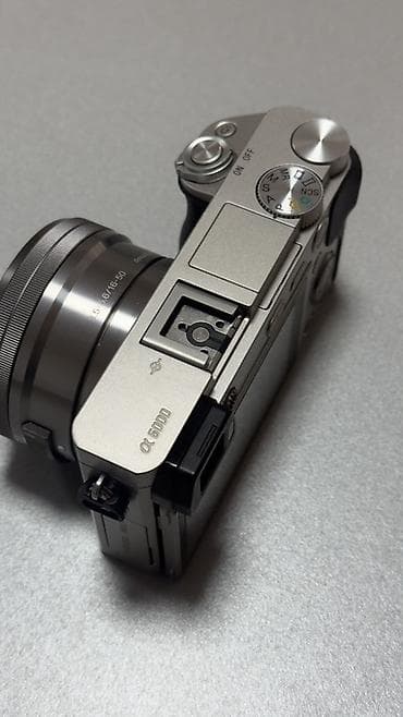 memory card: Камера Sony Alpha a6000 (серебристая) с объективом E PZ 16–50mm — 4