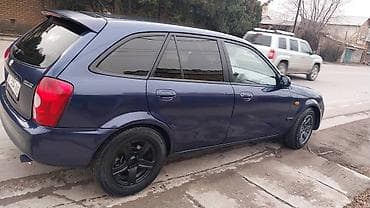 bl5 subaru: Mazda 323: 2003 г., Механика, Газ, Хэтчбэк — 5