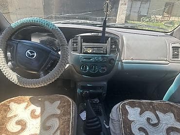 82 беларус трактор: Mazda Tribute: 2002 г., 2 л, Механика, Бензин, Кроссовер — 4