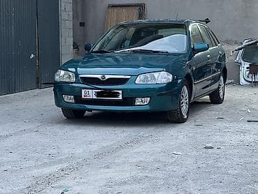 Mazda 323: 1999 г., 1.5 л, Автомат, Бензин, Хэтчбэк — 2