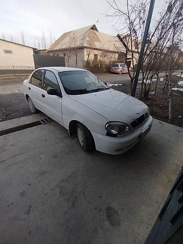 nisan march: Daewoo Lanos: 1998 г., 1.3 л, Механика, Бензин, Седан — 5