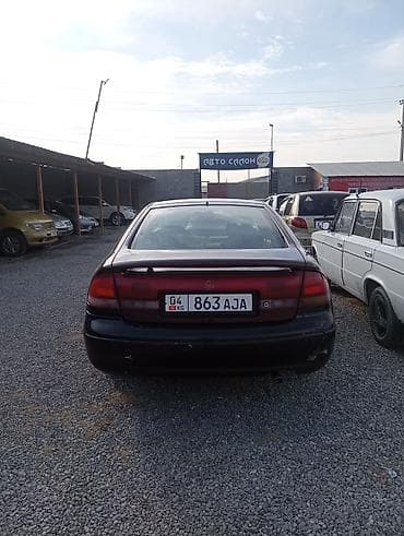 mazda kapella: Mazda Cronos: 1993 г., 1.8 л, Механика, Бензин, Седан — 4