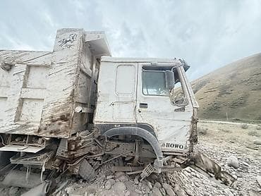 хово т х: Самосвал HOWO 6x4 (трёхосный) - Компоновка: задняя двухскатная — 4