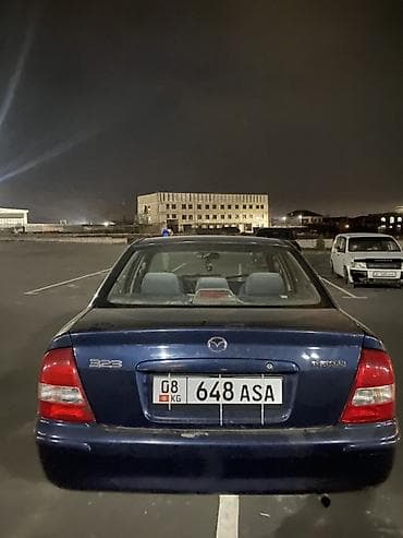 bmb 5: Mazda 323: 1999 г., 1.6 л, Механика, Бензин, Седан — 3