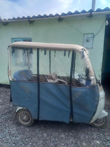 Скутеры: Трёхколёсный электрический скутер с закрытой кабиной - Тип — 1