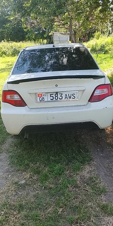 токмок зеркало: Daewoo Nexia: 2010 г., Кол менен иштөөчү, Седан — 2