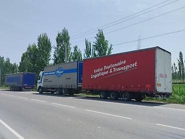 крыш: Грузовые автоперевозки тентованными автопоездами голова 2004 420лс — 2