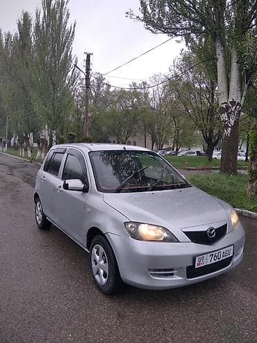 Mazda Demio: 2004 г., 1.3 л, Автомат, Бензин, Хэтчбэк