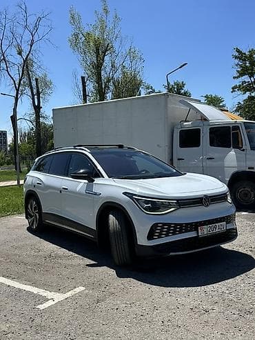 круг от прицепа: Volkswagen ID.6: 2022 г., Электромобиль, Кроссовер — 3
