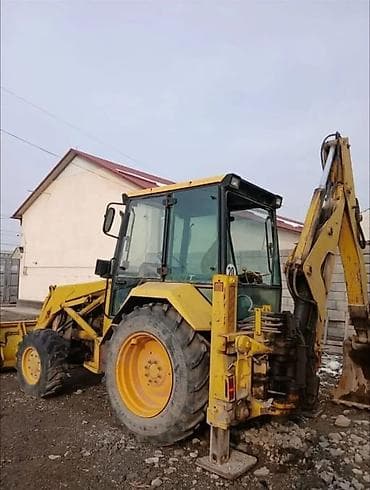 экскаваторы погрузчик: Экскаватор, Caterpillar, Колесный — 2