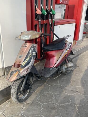 скутер белый: Макси-скутер Suzuki, 100 куб. см, Бензин, Б/у — 1