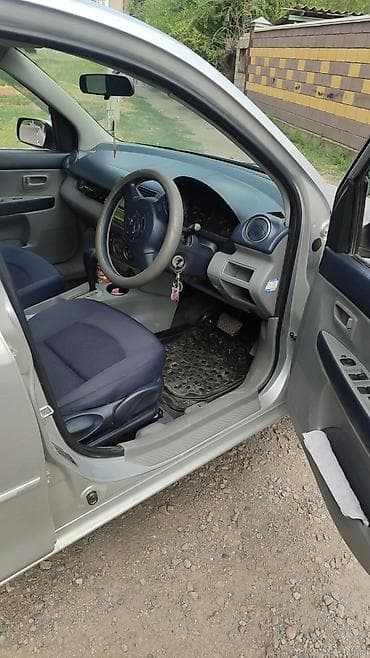 Транспорт: Mazda Demio: 2003 г., 1.3 л, Автомат, Бензин, Хэтчбэк — 2
