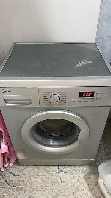 Стиральная машина Midea, фронтальная загрузка. - Электронное