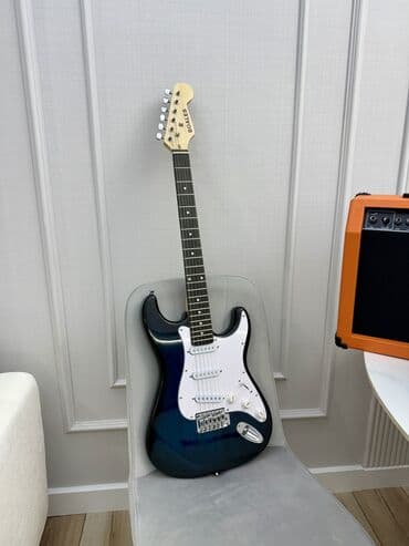 купить струны для гитары: Электрогитара новая. Тип стратокастер, ST, Stratocaster. В комплекте — 1