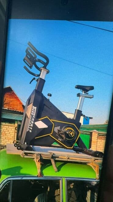 домашний велосипед тренажер: Велотренажер Transformer, выполненный в черном цвете с желтыми — 1