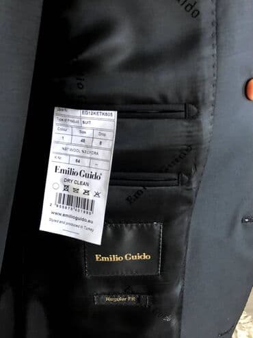 Продаю фирменный костюм вместе с брюками Цвет: чёрный Размер: 48 рост