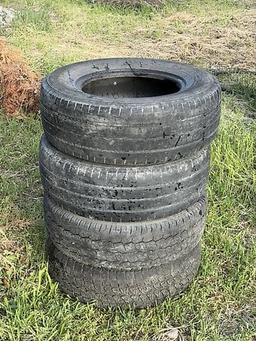 9 5j: Комплект из 4 автомобильных шин 225/70 R15 (без дисков). - — 1