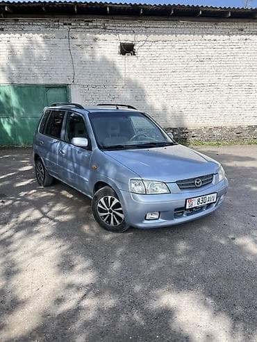 бар авто: Mazda Demio: 2001 г., 1.3 л, Кол менен иштөөчү, Бензин, Хетчбек — 3