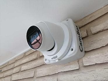 Уличная видеокамера Dahua (форм‑фактор turret) на кронштейне CamBox -