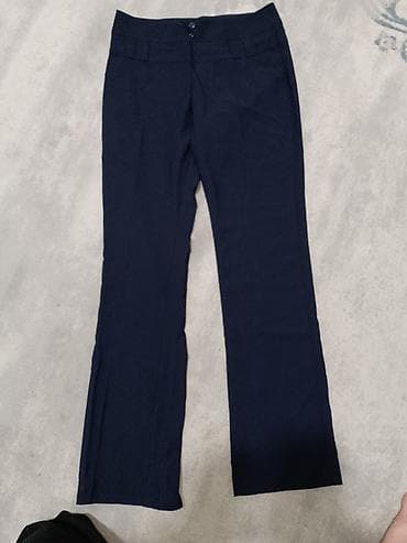 клёш: Классические женские брюки темно-синего цвета.Остаток, распродажа - — 1