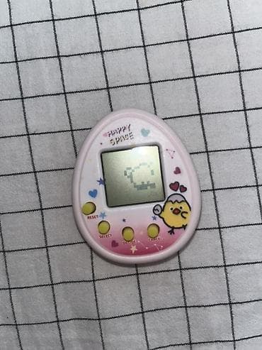 купить умные детские часы в бишкеке: Электронная игрушка «виртуальный питомец» (тамагочи-стайл) - Форма — 1