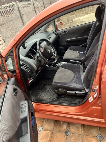 воздушный домкрат для авто: Honda Jazz: 2006 г., 1.3 л, Автомат, Бензиновая, Хэтчбэк — 2