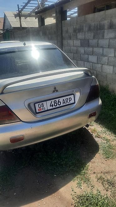Унаа сатуу: Mitsubishi Lancer: 2001 г., 1.6 л, Кол менен иштөөчү, Седан — 6