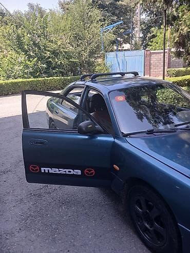 сетка авто: Mazda Cronos: 1993 г., 2 л, Автомат, Бензин, Седан — 1