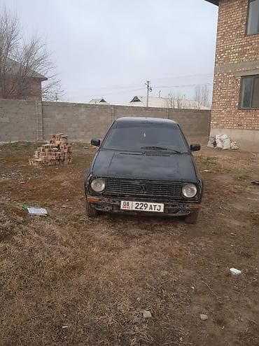 Volkswagen Golf: 1989 г., 1.8 л, Механика, Бензин, Седан
