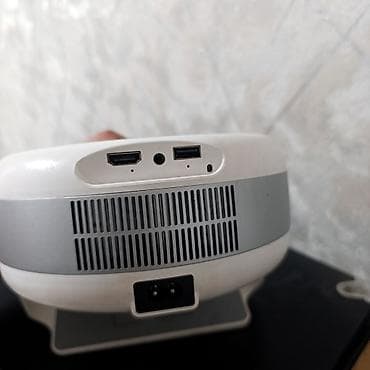 настольный диспенсер: Портативный проектор Smartbarty - Компактный дизайн с удобной — 3