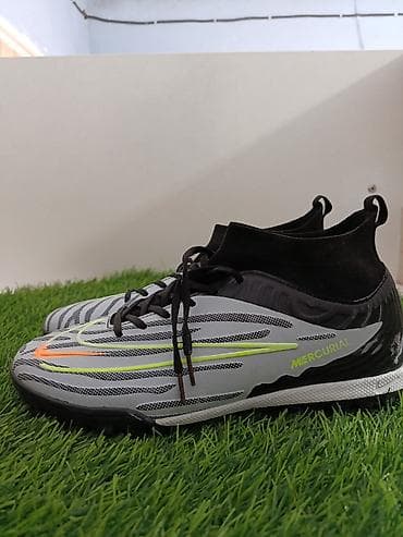 Футбольные бутсы/сороконожки Nike Mercurial с высоким носком-манжетой