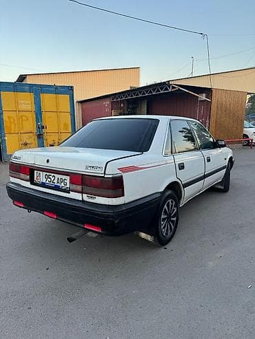 step wgn: Mazda 626: 1990 г., 2 л, Механика, Бензин, Седан — 7