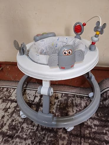 Ходунки для малышей с развивающей игровой панелью. - Круглая