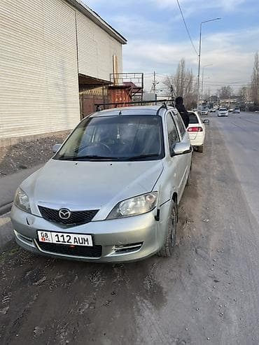 id 4: Mazda Demio: 2004 г., 1.3 л, Автомат, Бензин, Хэтчбэк — 2